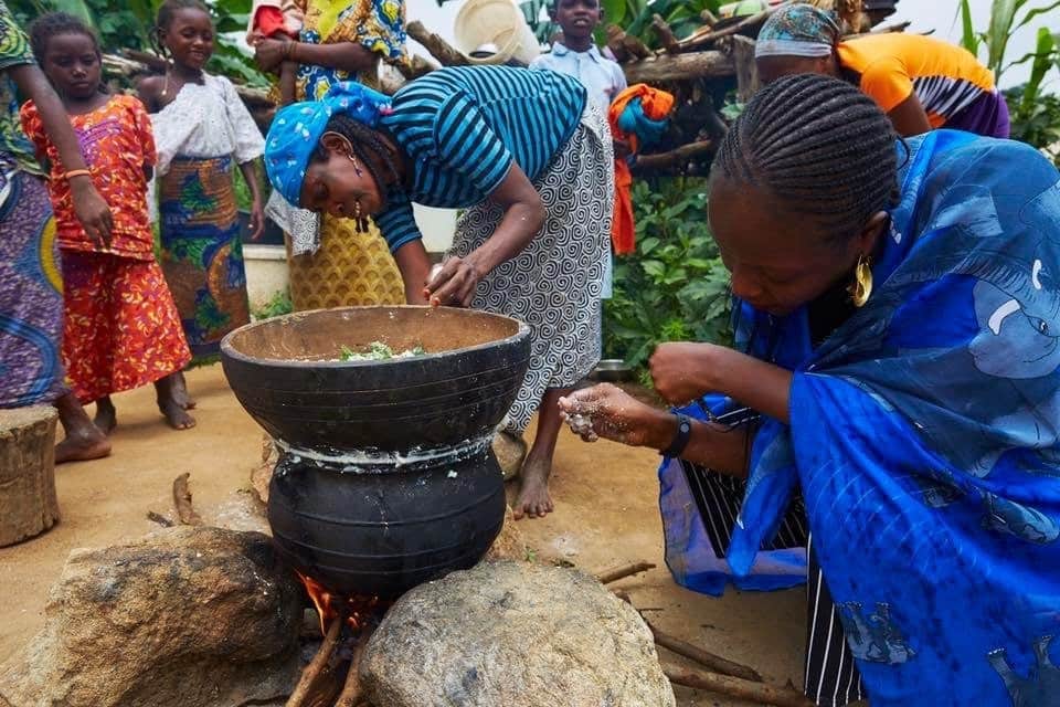 Chef Fatmata Binta cooking in an African village