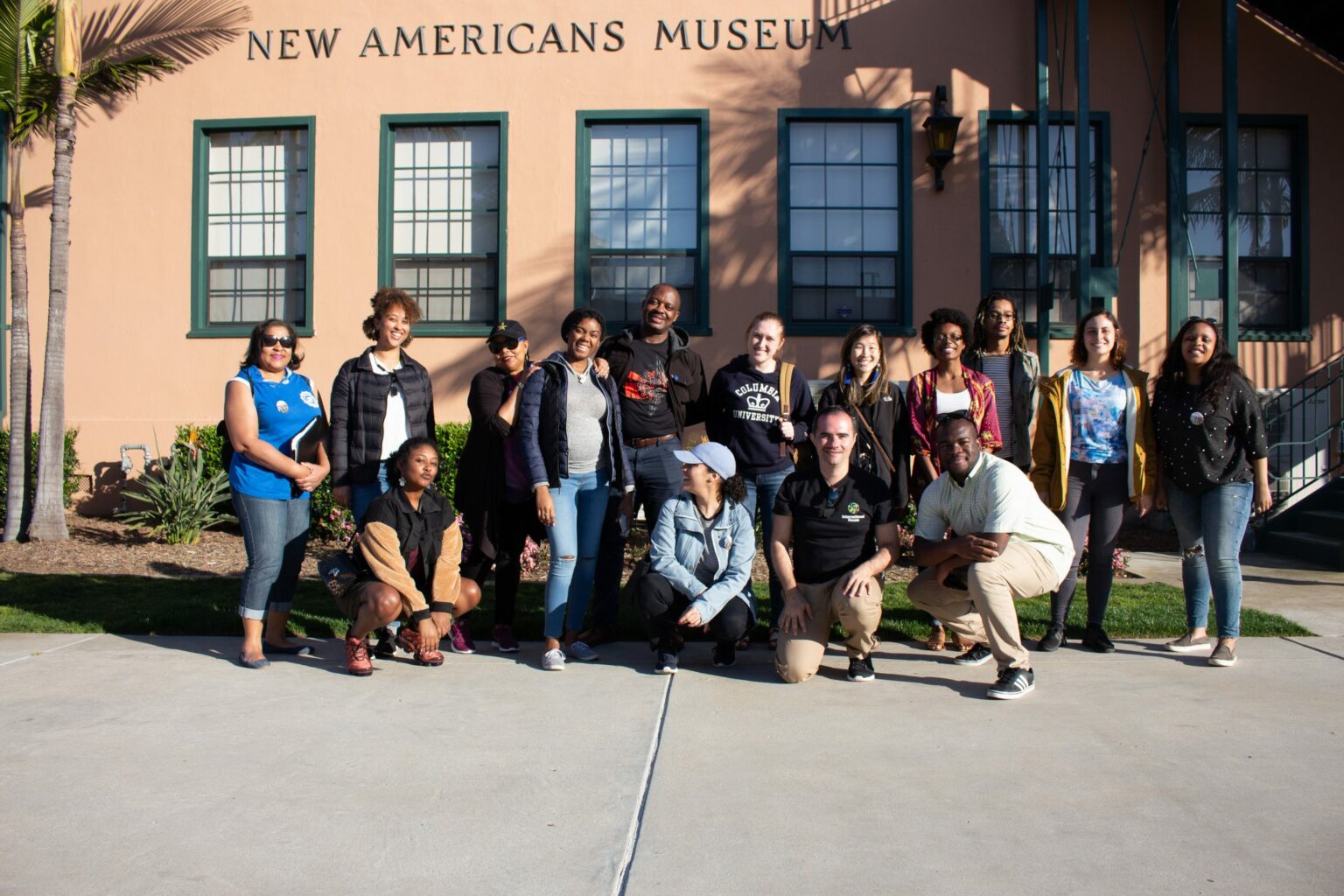 Kalin (far left) and Blean (2nd from left) in front of the New Americans Museum in San Diego