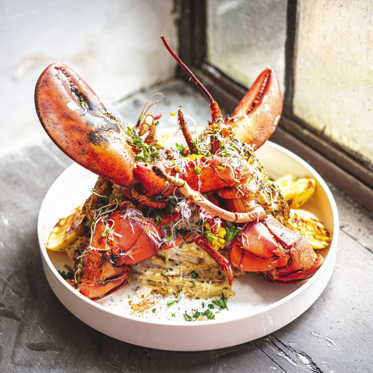 Cuisine Noir Chef Juwan Rice Crab Stuffed Lobster With Fettuccini Garlic White Wine Sauce Fresh Parmesan 1200x1200