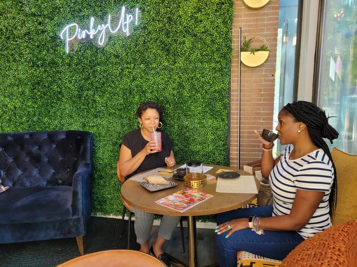 Cuples Tea House -- Charissa Garrett and Mia Robinson enjoy the Urban Tea Experience