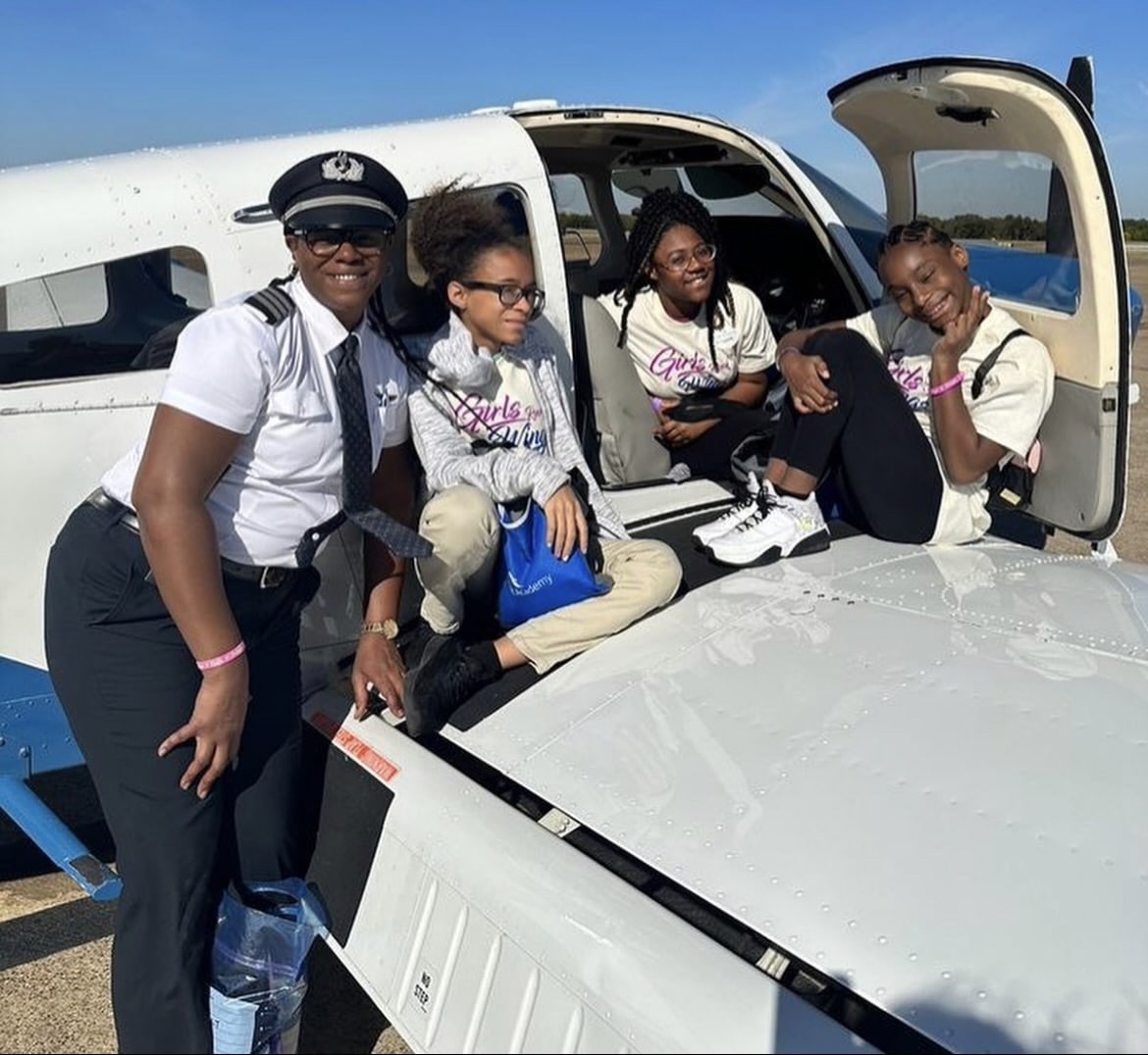 Students and instructor in the Sisters of the Skies' Girls Rock Wings program