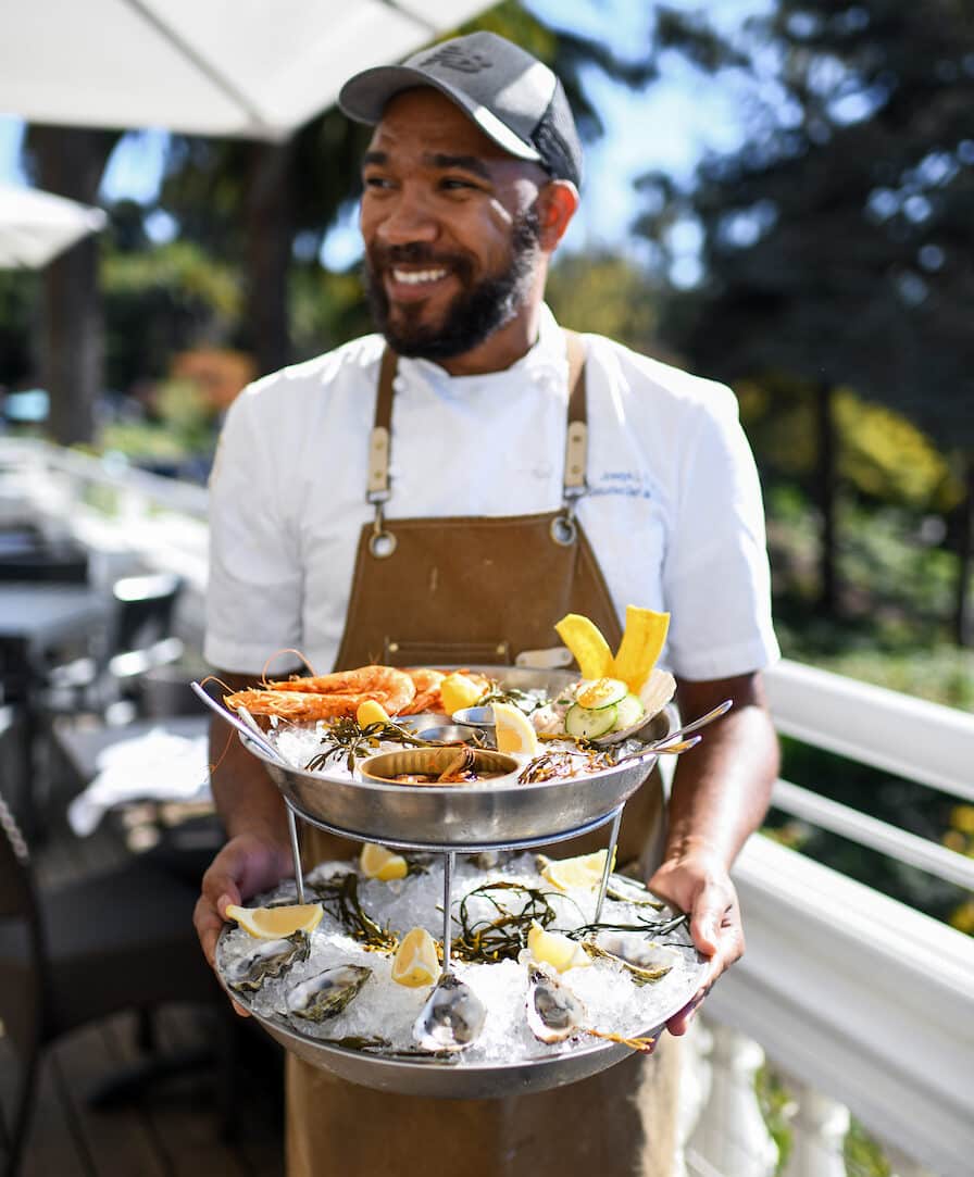 Claremont Hote & Spa - Joseph Paire holding a seafood and oyster trays