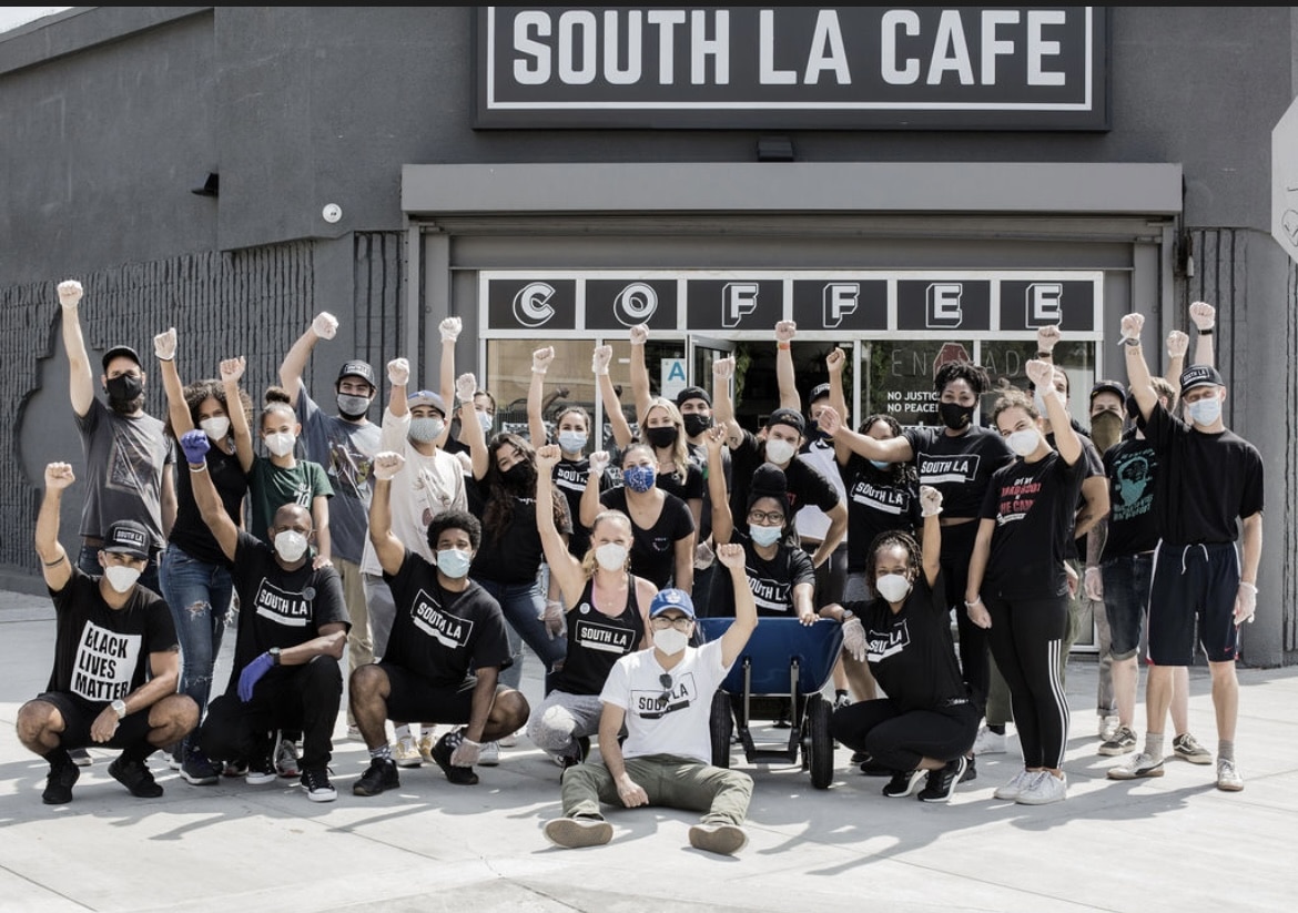 Team of South LA Cafe gathered in front 