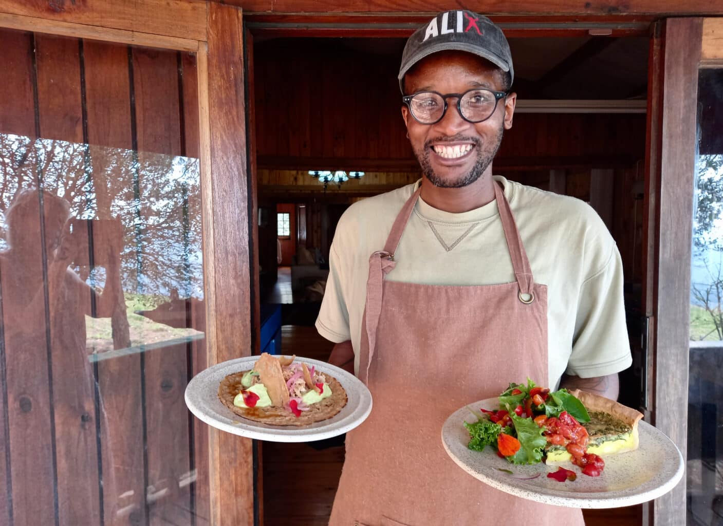 Chef Ali Majija at The Farmer’s Table with a smoked chicken and chicken skin chips oatmeal wrap and a quiche with garden salad.