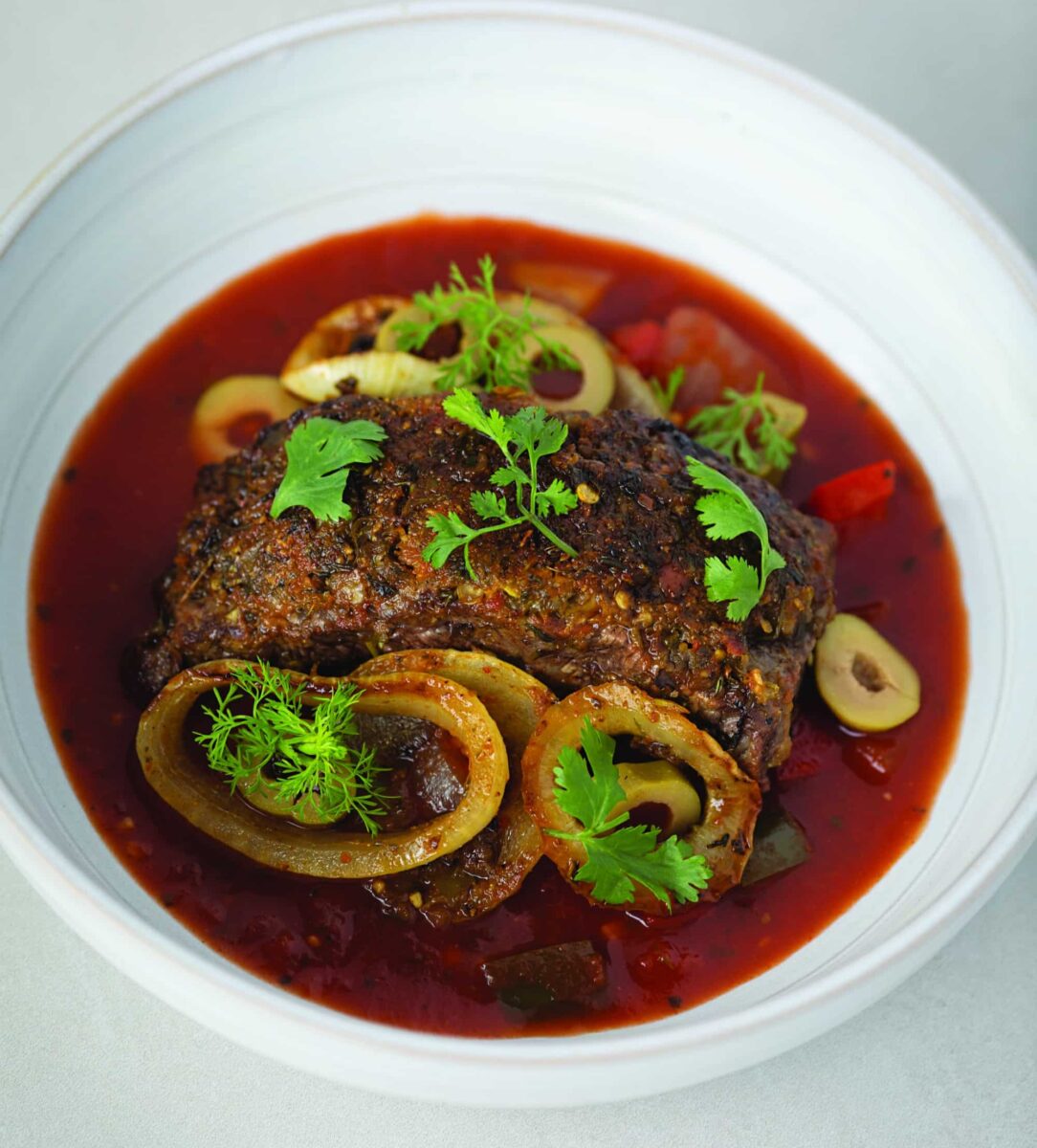 Bistec Encebollado from Roots, Heart, Soul cookbook by Todd Richards