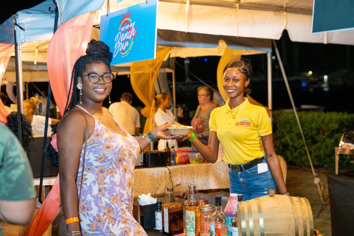Attendees and food vendor at the 2023 Antigua and Barbuda Restaurant Week